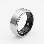 Silver smart ring with electronic components on a white background