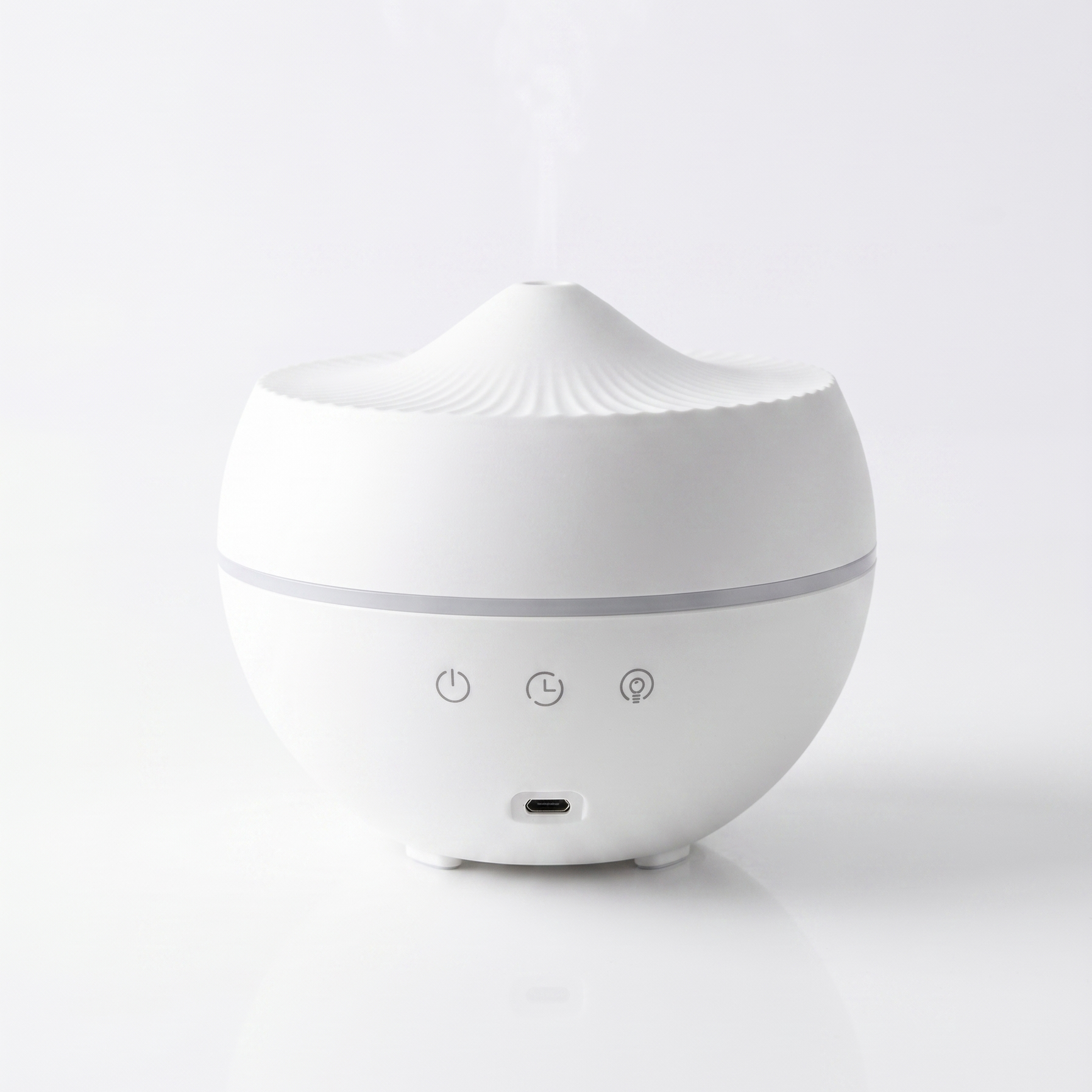White diffuser on a light gray background