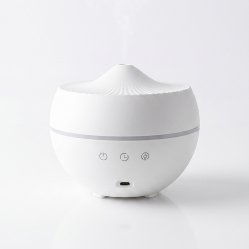 White diffuser on a light gray background