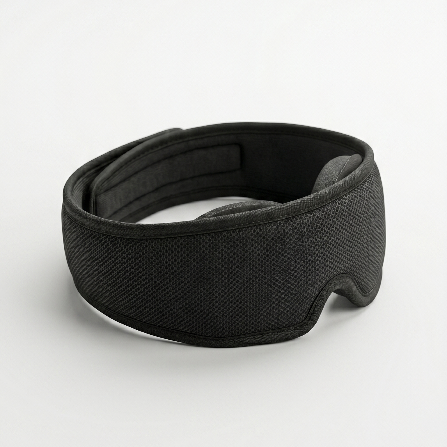 Black sleep mask on a white background